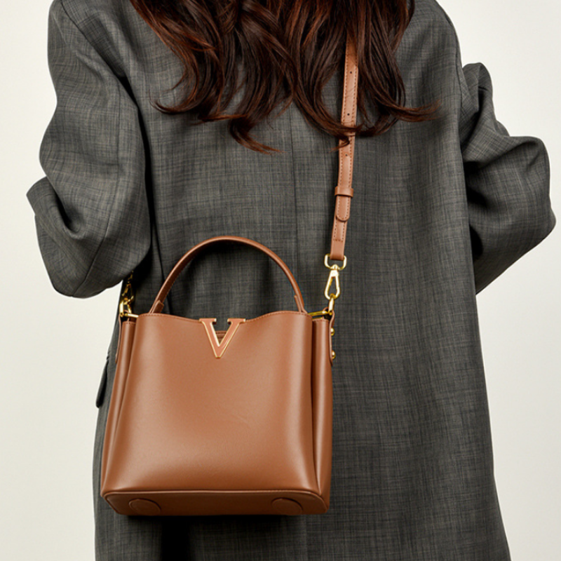 Structured V-Emblem Bucket Bag